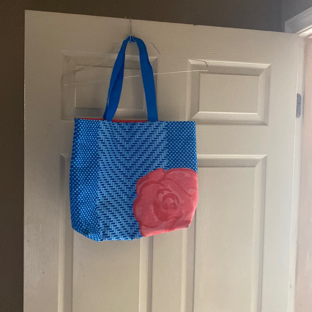 Blue tots bag with red rose